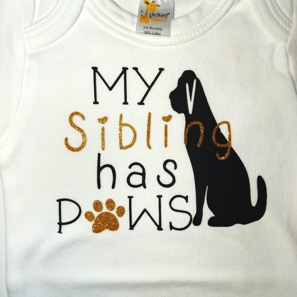 My sibling has paws onesie